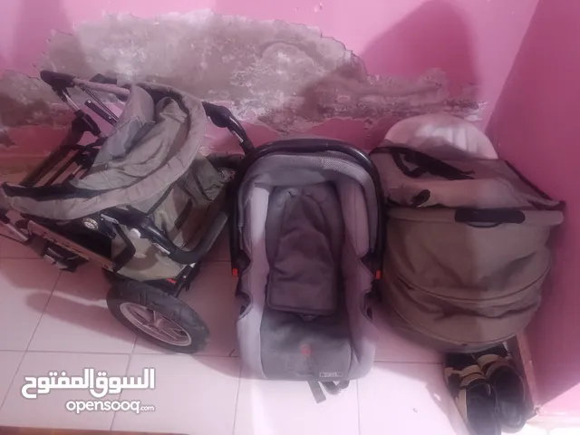 عربة أطفال جديدة