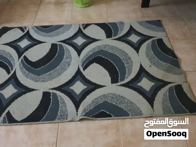 سجاد ه رماديه زخار هندسيه