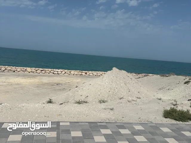 اجمل ارض في دلمونيا على البحر المفتوح جار واحد فقط 774متر مربع بسعر مغري