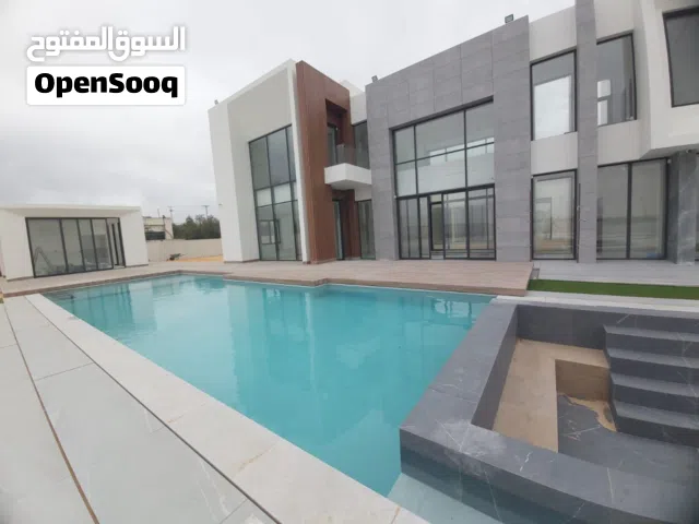 1000 m2 5 Bedrooms Villa for Sale in Amman Airport Road - Manaseer Gs