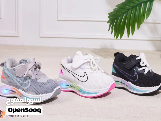 كوتشي Nike اطفالي ترندي جداا ولا غني عنه مقاس من 22 : 26 اسود ابيض رمادي   Code A5351 بينور