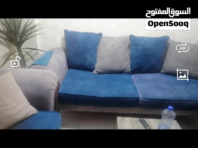 طقم كنب للبيع لون سكني وتركواز