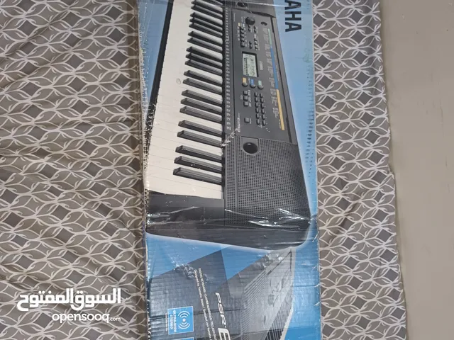 YAMAHA PSR-E253 PIANO WITH STAND AND PORTABLE CABLE FOR 400sr CASH ONLY