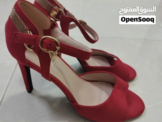 Red With Heels in Muscat