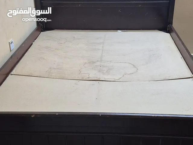 used wooden bed