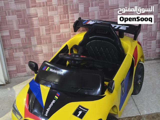 سيارة اطفال شحن بطارية  جديده وشاحن