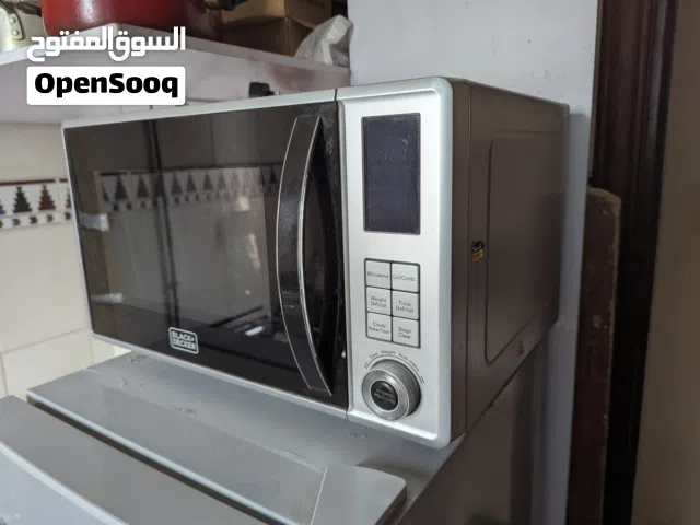 black n decker Microwave oven for sale in Butina Sharjah 25aed,