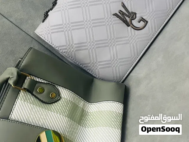 الأناقة والتمكين" (مناسب للشنط الكلاسيكية/الرسمية)