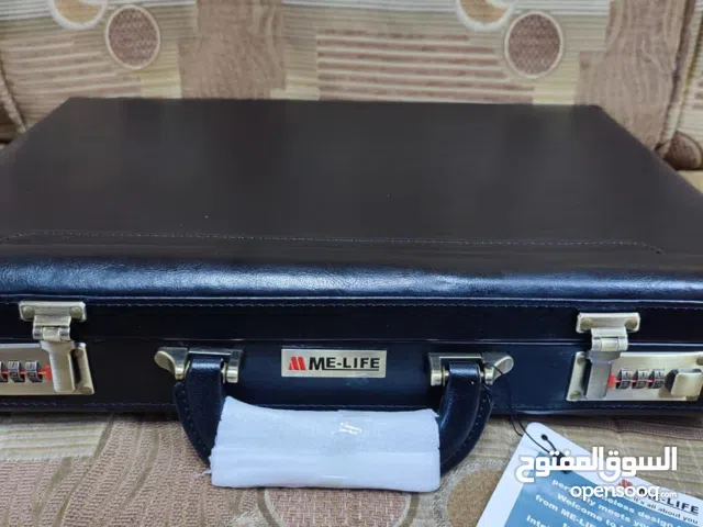 شنطة جلد برقم سري