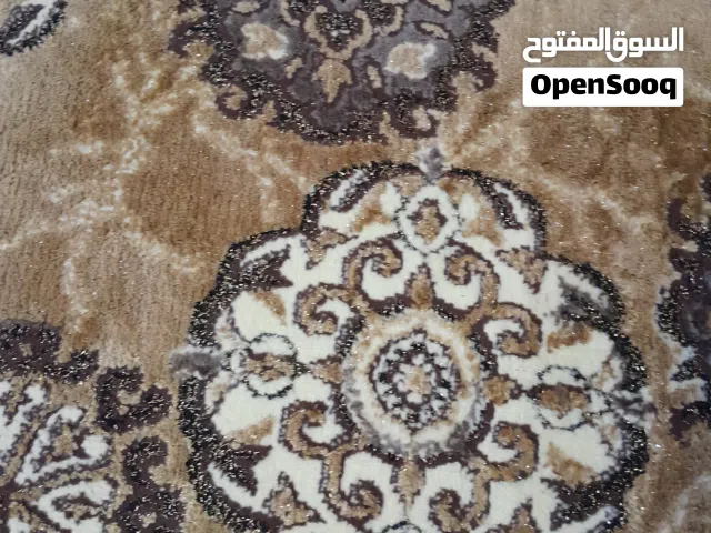 سجاد قص بحاله ممتازه ذهبي بني