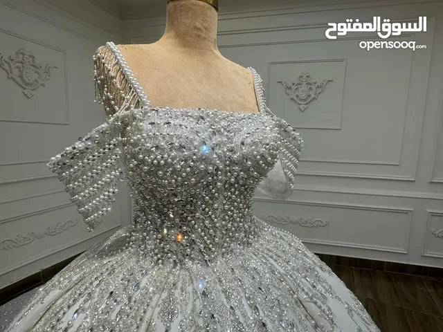 Selling and designing wedding dresses all over the world
