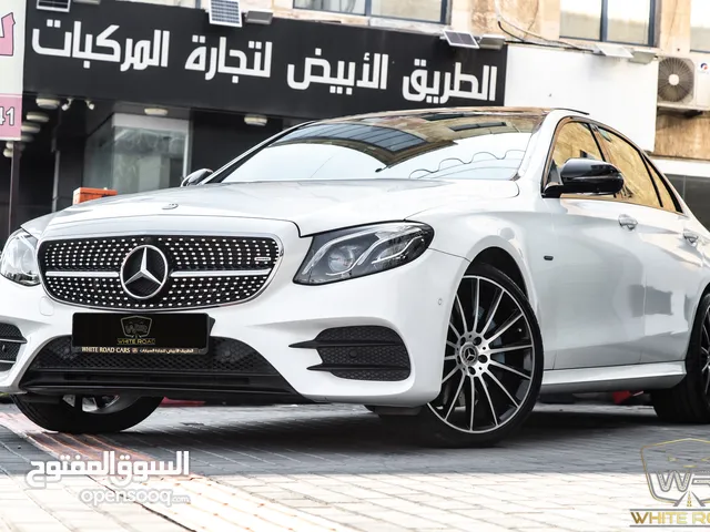 Mercedes E350e Plug in hybrid Amg kit Night Package 2018   السيارة وارد الشركة و قطعت مسافة 50,000