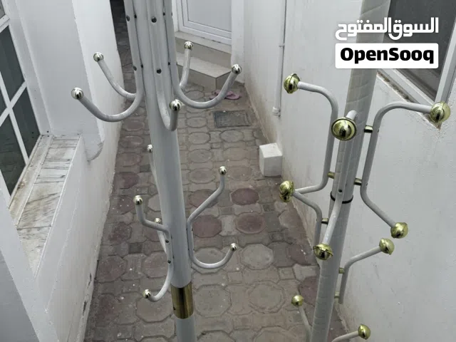علاقات ملابس freestanding metal coat