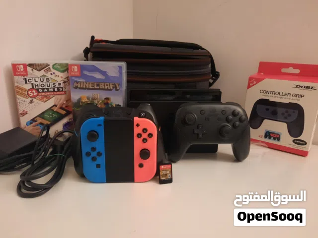 nintendo switch with controllers games etc