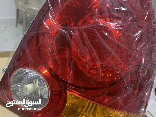 سطب يمين عدسة 2003 اصلي جديد