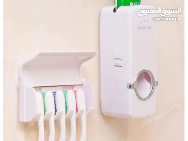 Toothpaste dispenser and toothbrush holder...