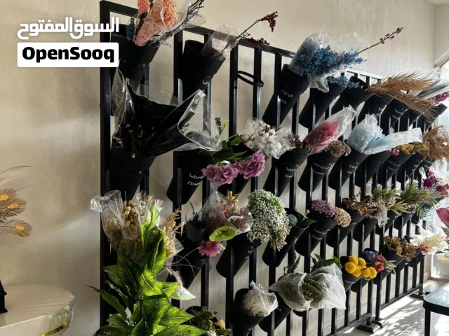 حامل زهور للبيع