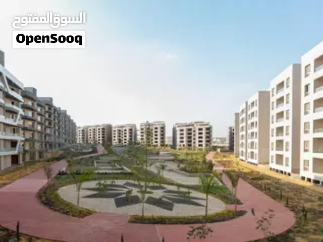 شقة للبيع استلام فوري ف كمبوند زيزينيا المستقبل أمام مدينتي دقائق للتجمع والعاصمه علي الطريق الدائري