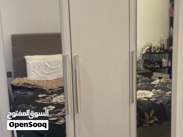 wardrobe + matching cabinet + bed