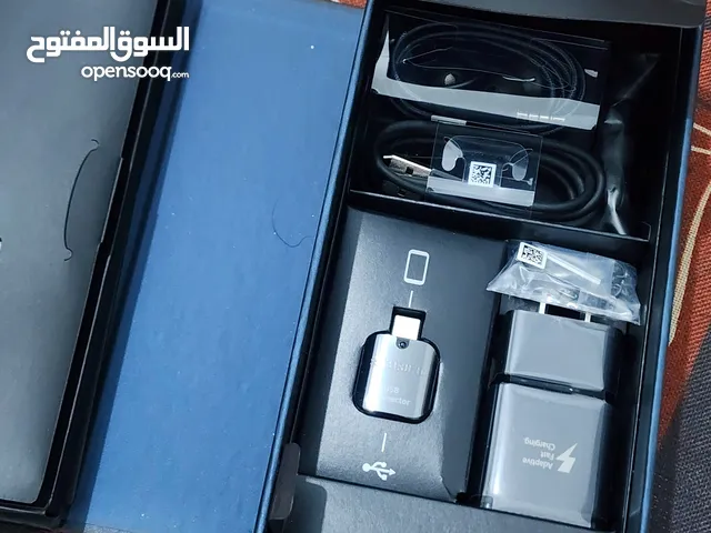 سماعات وشاحن وكالة نوت 9 جديد