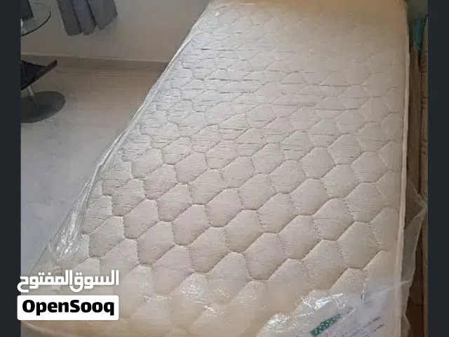Single cot and Bed with double shelf side table