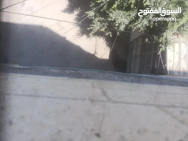 عمارة لبيع بالقرب من البنك العربي الشارع الرئيسي