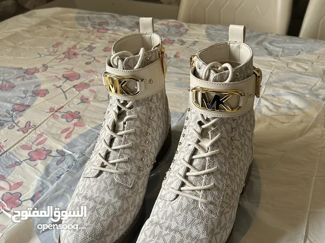 White Boots in Al Riyadh