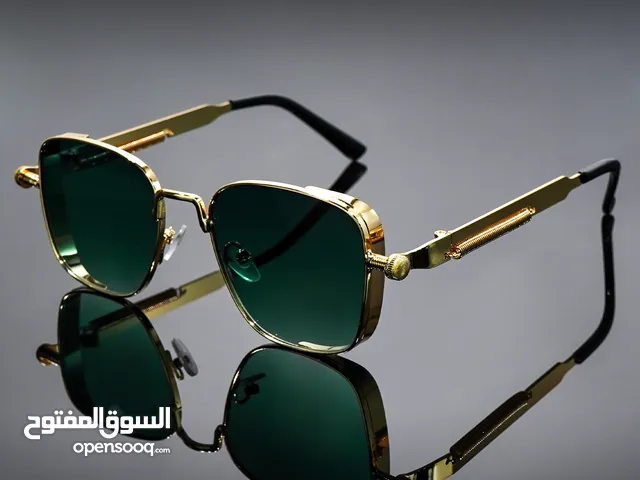 Stylish men's sunglasses with a square gold metal frame... Dark gradient lenses... A luxurious and p
