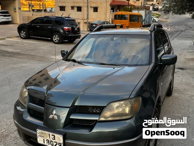 2003 ميتسوبيشي اوتلاندر GLS