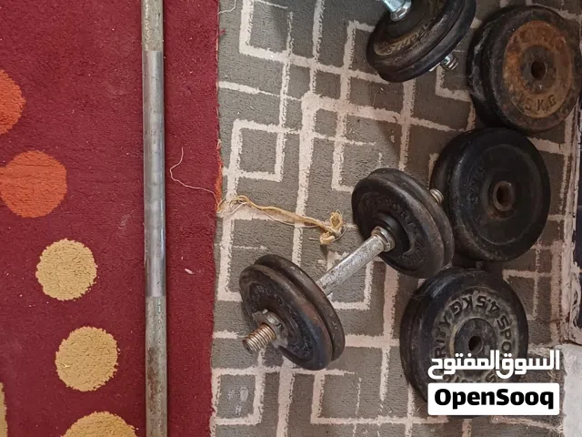 بار مع دنابل اثنين ووزن 50 كيلو شبه جديد