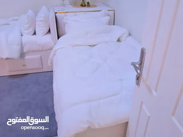 غرفة نوم كاملة مكونة من سريرين