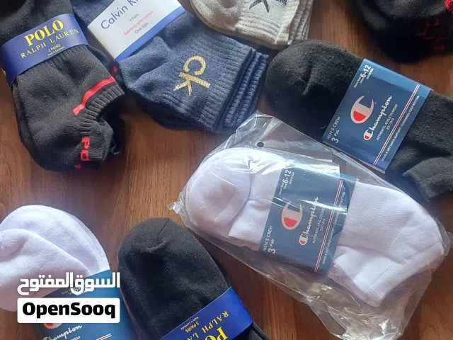 جرابات ماركة POLO صناعة كمبوديا لون ابيض واسود وحرابات ماركة CHAMPION صناعة الهند قياس 39-44 البكيت