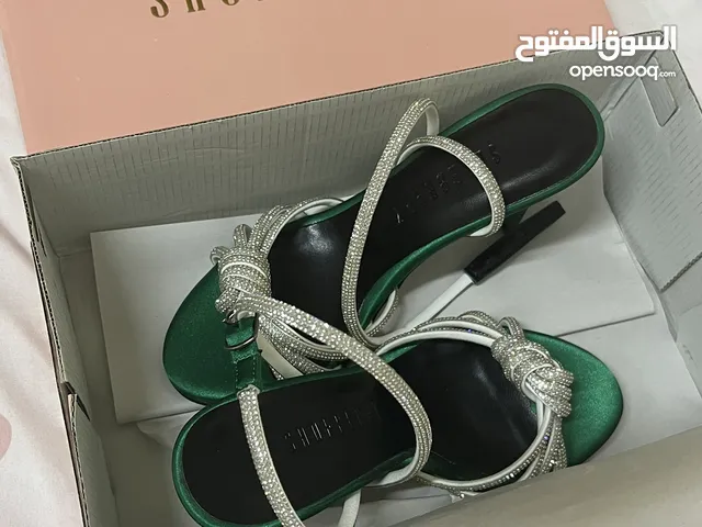Green With Heels in Ajman