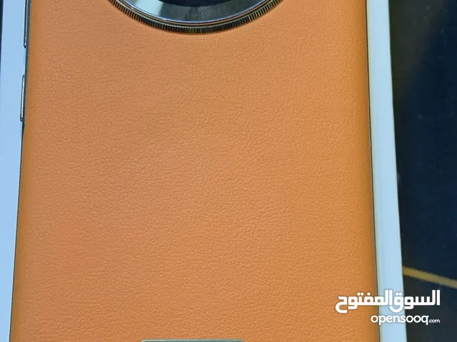 اللون البرتقالي Honor x9c موبايل
