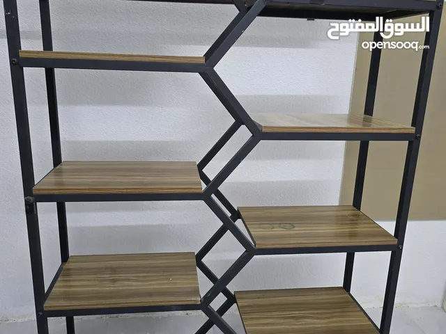 رفوف محل مستخدمه اللبيع