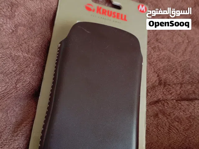 حامله هاتف، من الجلد الطبيعي .