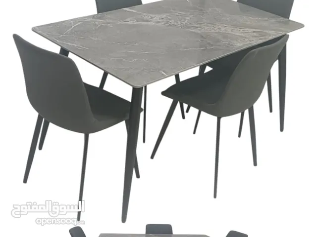 We are selling brand new dining table and chairs