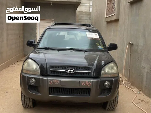زجاج توسان 2007 خلفي