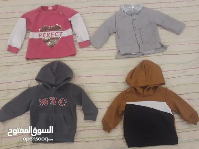 200 قطعة ملابس مستعملة أطفالى