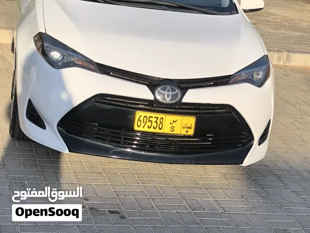 كرولا 18 للبيع .  تسجيل جديد بدون خروج ارباج ولون ممتاز