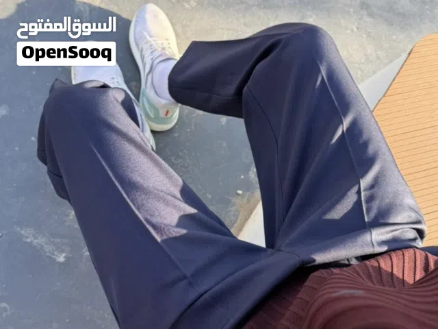 بنطرون قماش كصه عدلة طول 104 قياس 34 لون نيلي