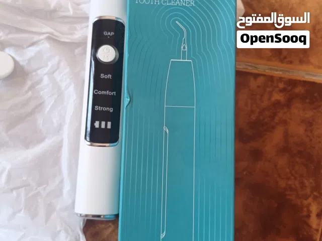 جهاز تنظيف الأسنان وإزالة الجير بالموجات فوق الصوتية (Ultrasonic Tooth Cleaner).