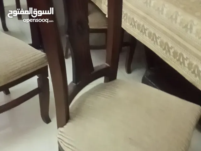 طاولة سفرة مع 8 كراسي خشب وجه الطاولة محفور وزجاج للاستفسار الاتصال