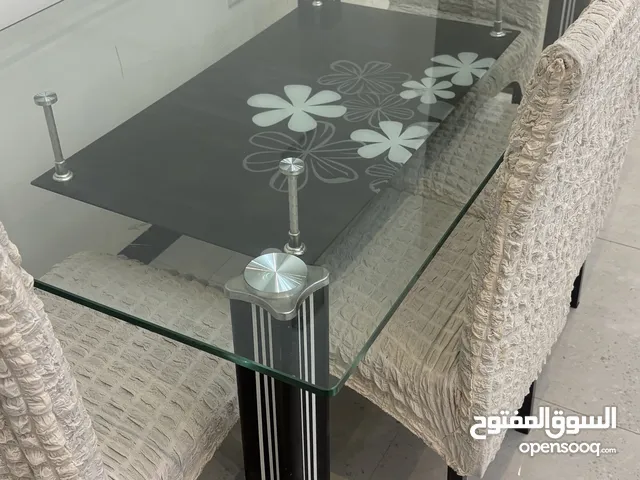 طاولة طعام زجاج
