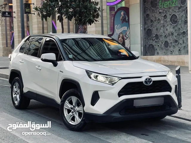 تويوتا راف فور هايبرد أبيض لؤلؤي 2021 فل اتوماتيك