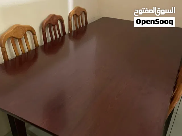 8 seater wooden dining table