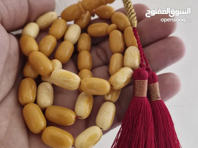 متوفر مسباحين تراب الكهرم اصفر وثاني نوع مجهول