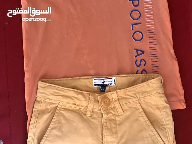 تيشيرت مع شورت ماركة بولو الاصليه لون البرتقالي