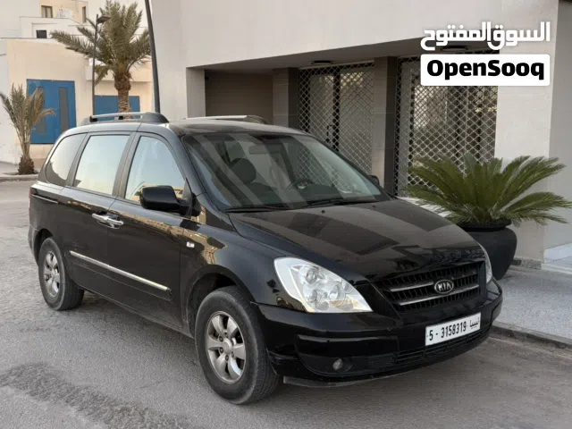 2010 كيا كرنفال EX