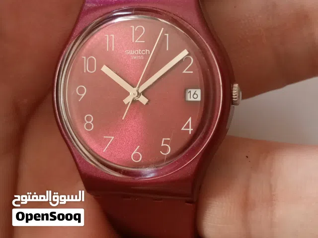 ساعة سواتش أصلية لون عنابي شبه جديدة بدون عيوب بدون شخوط للبيع بسعر مناسب جدا حرق بدون مرفقات.......